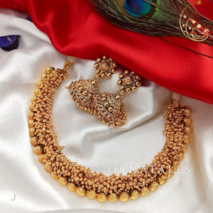 Golden Gajra necklace set handcrafted with layered golden ball beads in a traditional South Indian bridal style.