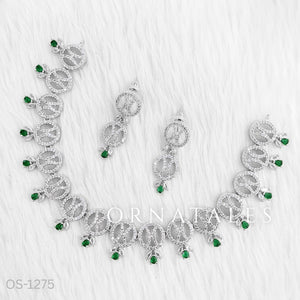 Emerald Green Diamond Cut Necklace Set with interlinked round loops, droplet stones, and matching earrings – bridal & festive jewellery – Ornatales