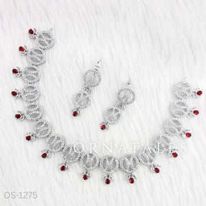 Ruby Red Diamond Cut Necklace Set with interlinked round loops, droplet stones, and matching earrings – festive & wedding jewellery – Ornatales