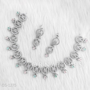 Pink & Mint Diamond Cut Necklace Set with interlinked loops and droplet stones – bridal and festive jewellery with matching earrings – Ornatales