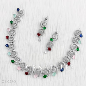 Multicolor Diamond Cut Spiral Necklace Set featuring spiral motifs with colorful stones and matching earrings – festive jewellery – Ornatales