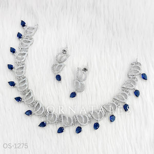 Royal Blue Diamond Cut Necklace Set with wave-like looping structure and droplet stones – matching earrings – Ornatales