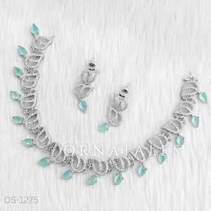Mint Diamond Cut Necklace Set with wave-like looping structure and droplet stones – matching earrings – Ornatales