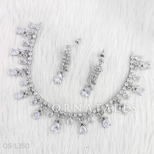 Crystal White Diamond Cut Necklace Set featuring cascading teardrop stones and clustered diamond detailing – Ornatales