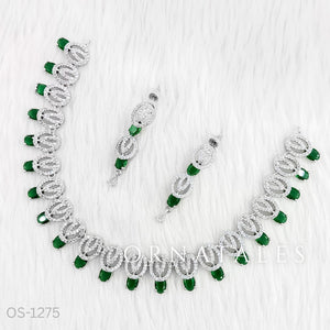 Emerald Green Diamond Cut Necklace Set featuring spiral motifs with teardrop stones – Ornatales