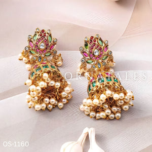 Padmarekha Heritage necklace set with pink-red lotus motif, green and white kundan stones, and golden pearl drops in temple jewellery style.