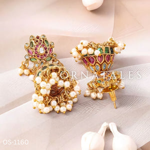 Padmarekha Heritage necklace set with pink-red lotus motif, green and white kundan stones, and golden pearl drops in temple jewellery style.