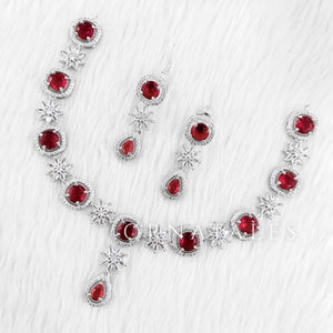 Ruby Red Diamond Cut Necklace Set with starburst motif and teardrop accents – Ornatales