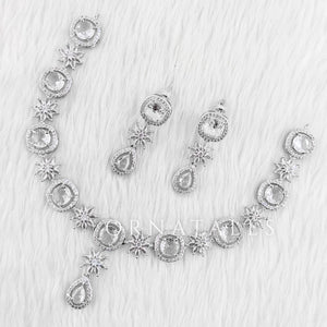 Crystal White Diamond Cut Necklace Set with starburst motif and teardrop design – Ornatales
