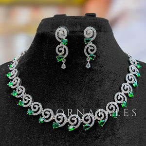 Emerald Green Diamond Cut Spiral Necklace Set with droplet stones and matching earrings – elegant swirl design – Ornatales