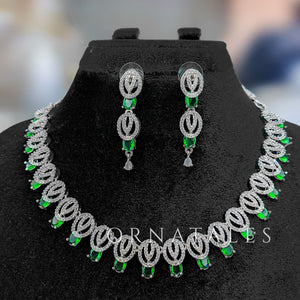 Emerald Green Diamond Cut Necklace Set featuring spiral motifs with teardrop stones – Ornatales
