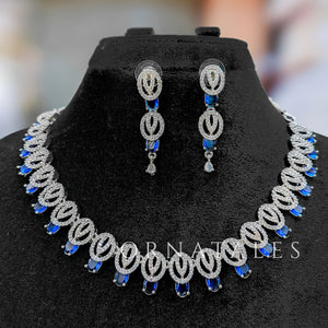 Royal Blue Diamond Cut Necklace Set featuring spiral motifs with teardrop stones – Ornatales