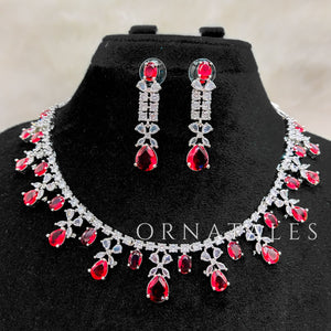 Ruby Red Diamond Cut Necklace Set featuring cascading teardrop stones and clustered diamond detailing – Ornatales