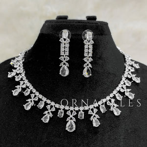 Crystal White Diamond Cut Necklace Set featuring cascading teardrop stones and clustered diamond detailing – Ornatales