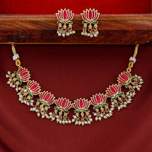 Kamalini Pearl Drop Choker Set with ruby-gold lotus motifs, hanging pearl clusters, and matching lotus drop earrings in a temple-inspired design.