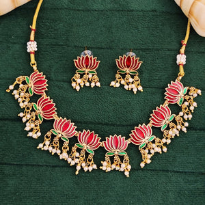 Kamalini Pearl Drop Choker Set with ruby-gold lotus motifs, hanging pearl clusters, and matching lotus drop earrings in a temple-inspired design.