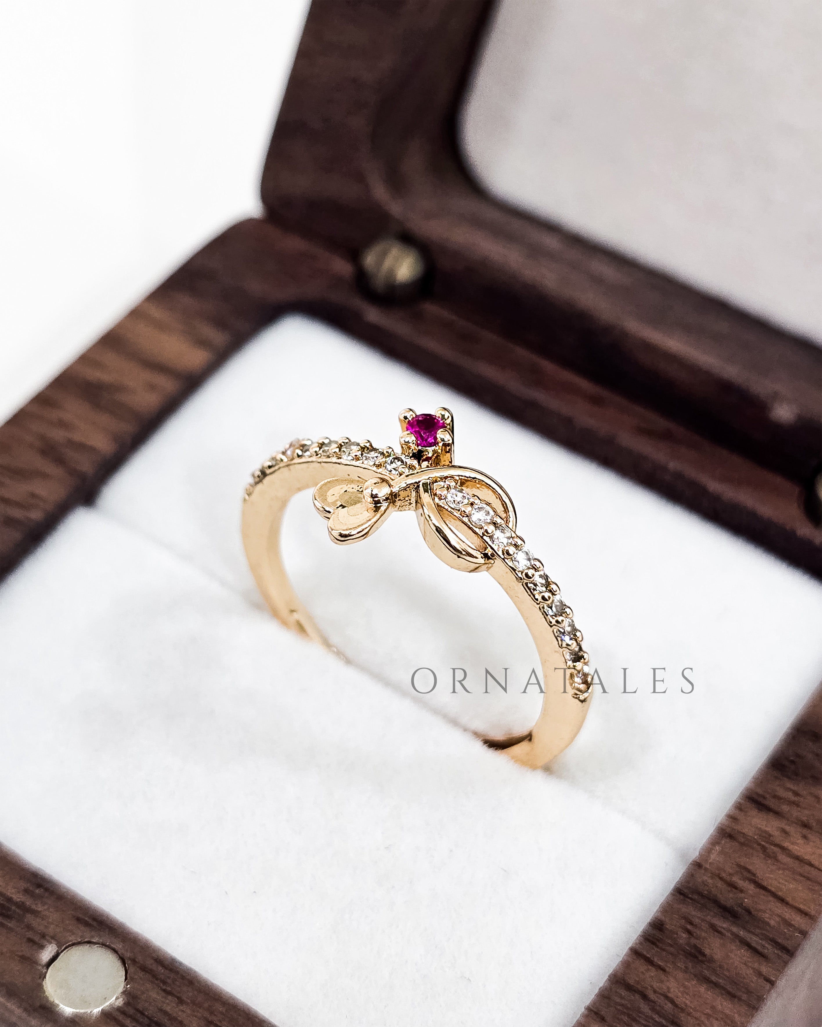 Gold plated adjustable ring with zircon stones and engraved pattern