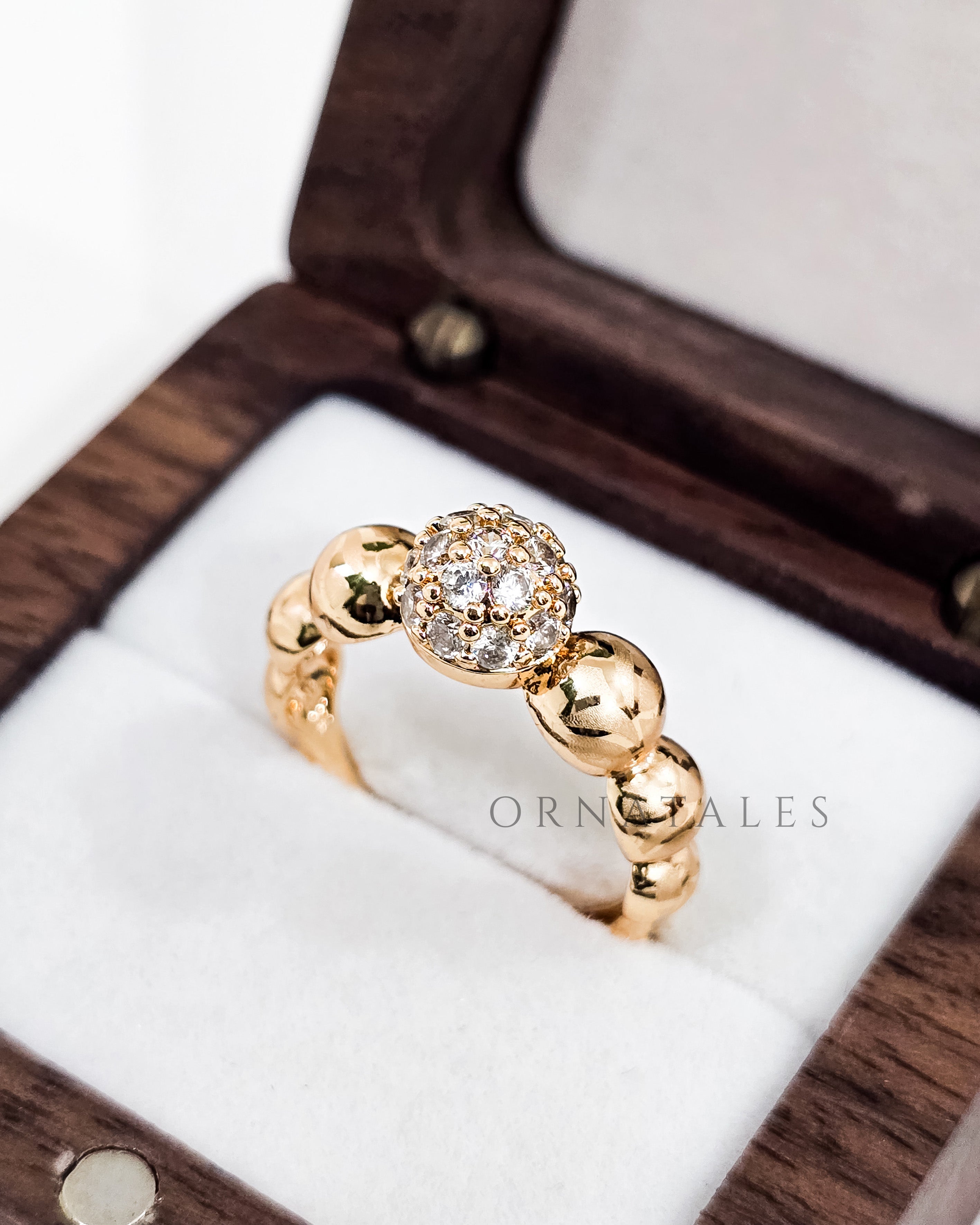 Gold plated adjustable ring with zircon stones and engraved pattern