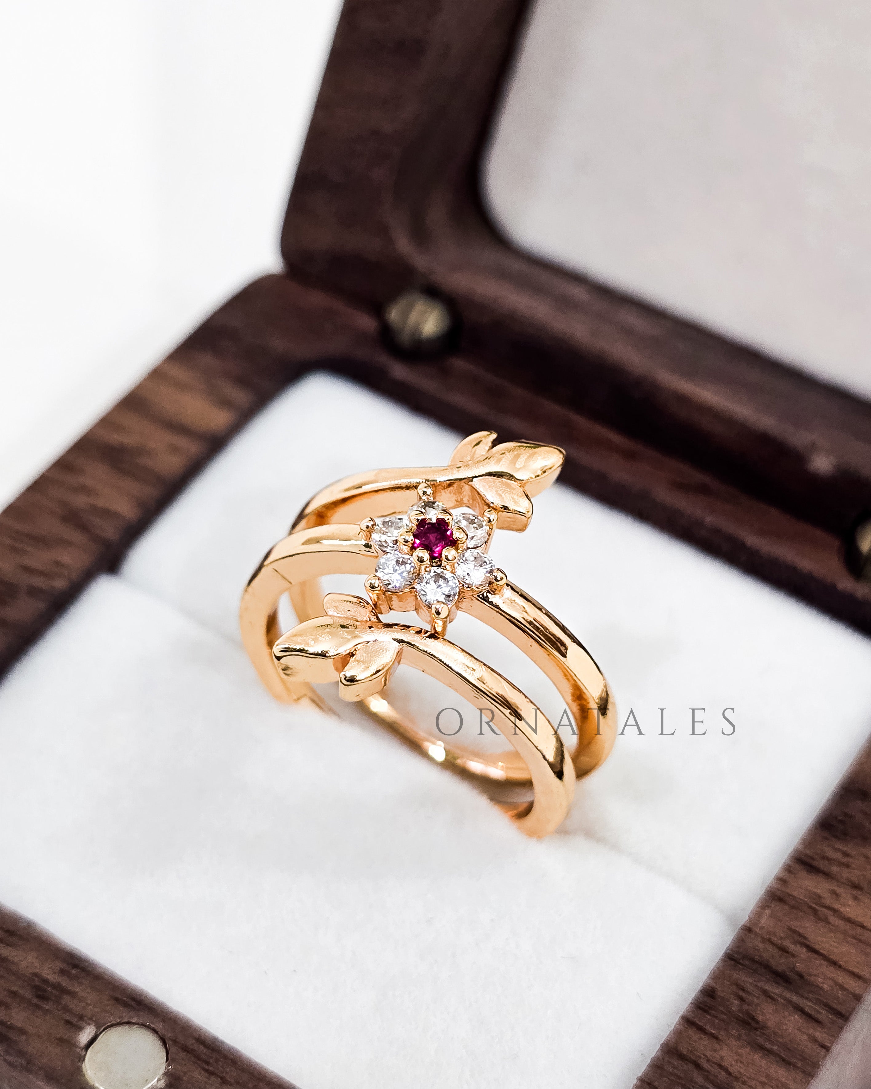 Gold plated adjustable ring with zircon stones and engraved pattern