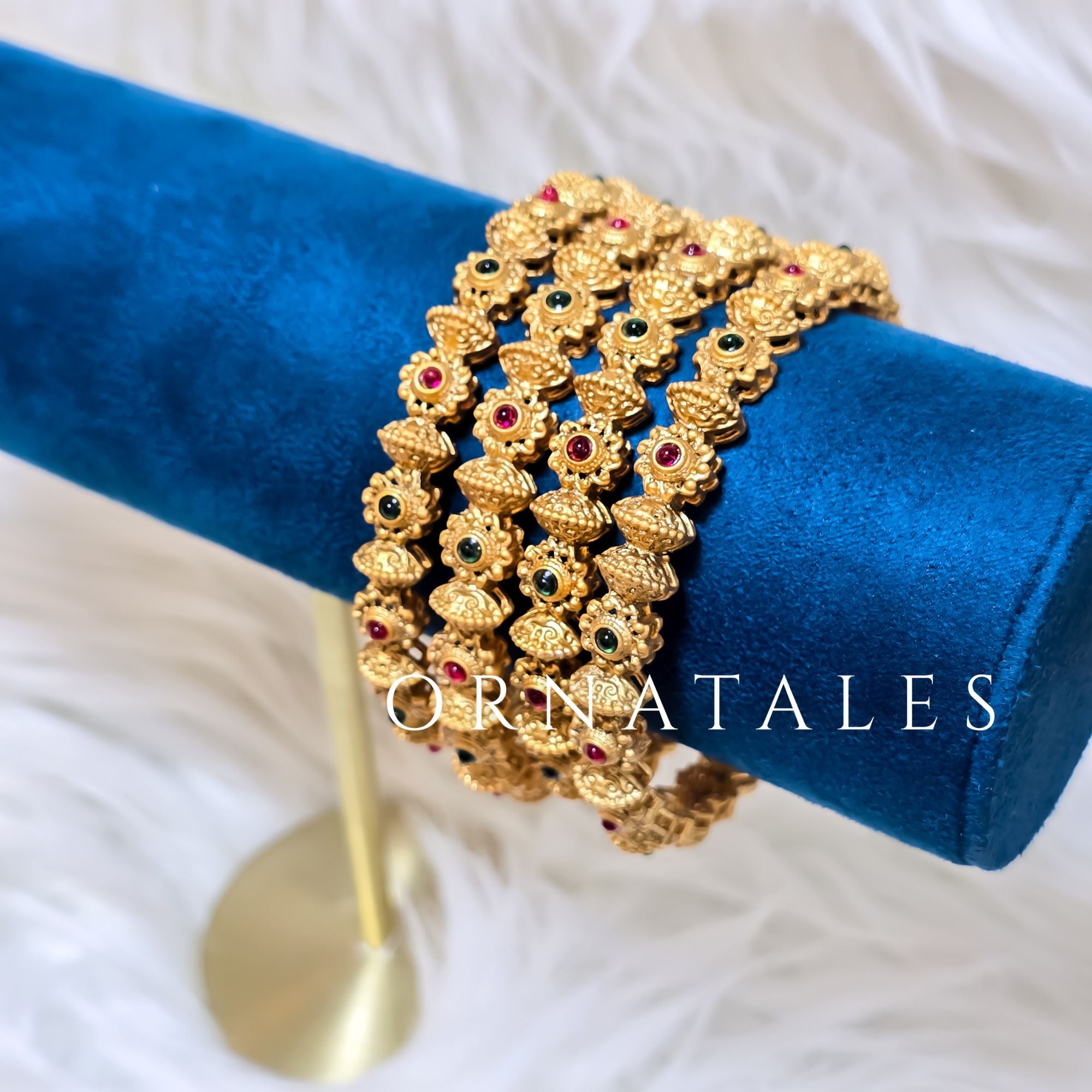 Matte Gold South Indian Bangles featuring Floral Temple Motifs with Ruby & Emerald Stones – Heritage Chain-Style Design – Ornatales