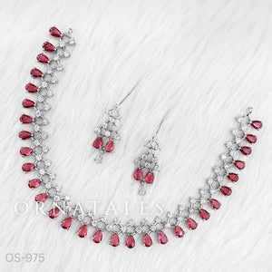 Magenta Diamond Cut Necklace Set featuring symmetrical teardrop stones with diamond cluster detailing – Perfect for evening & festive wear – Ornatales