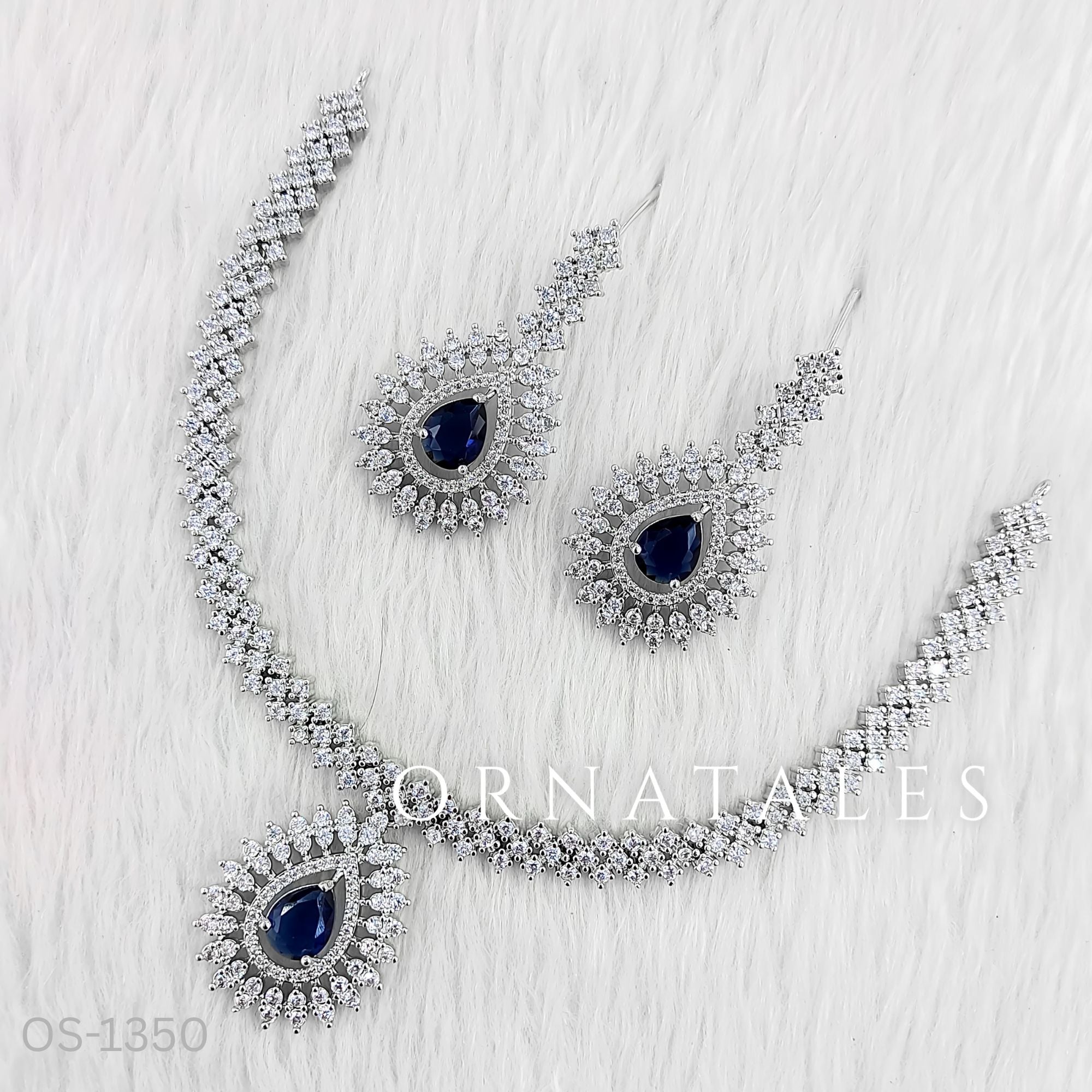 Royal Blue Diamond Cut Necklace Set featuring Imperial Teardrop Halo design with pear-shaped centerpiece and layered diamond halos – Bridal Jewellery – Ornatales