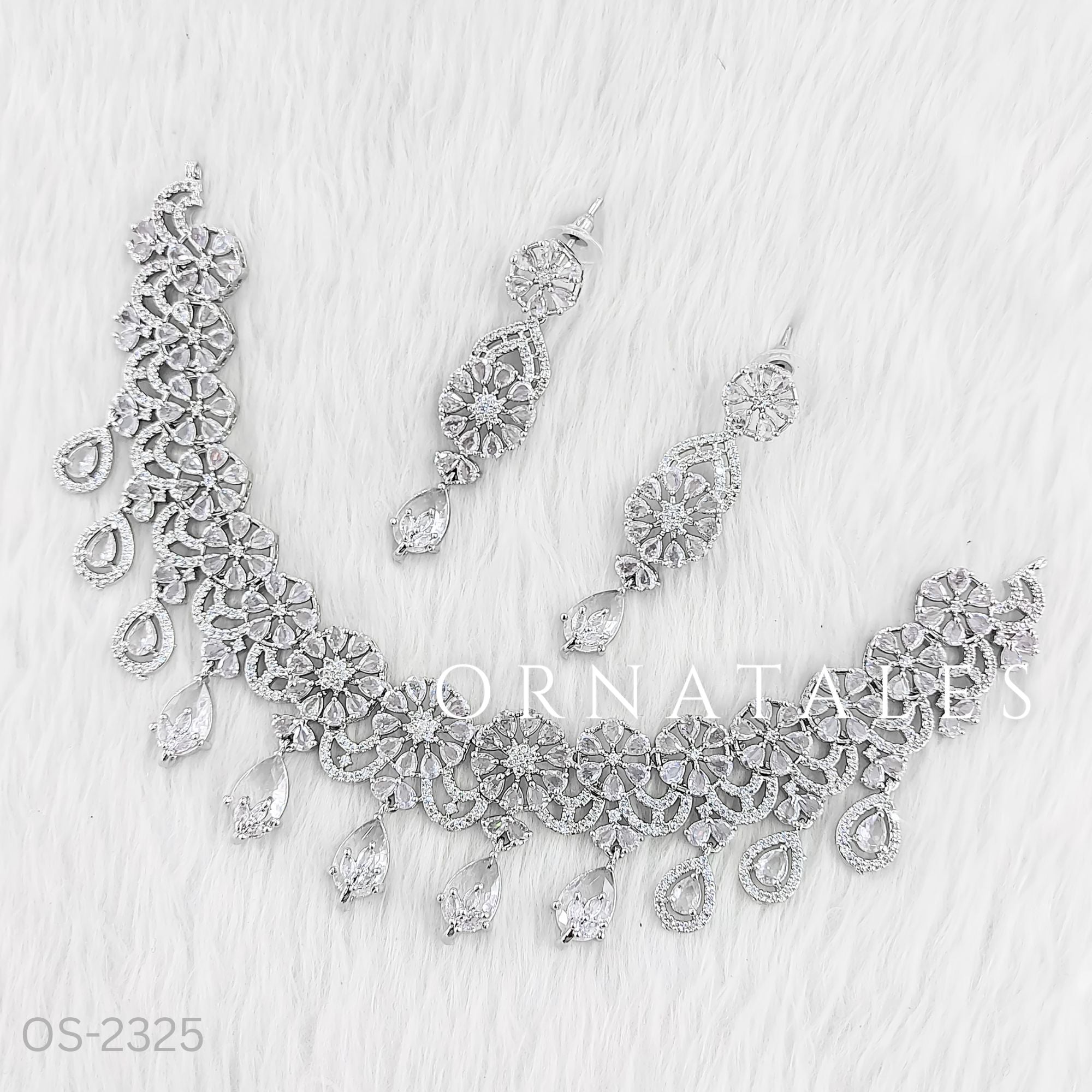 Crystal white diamond cut necklace set with floral cluster and teardrop stones – bridal jewellery – Ornatales
