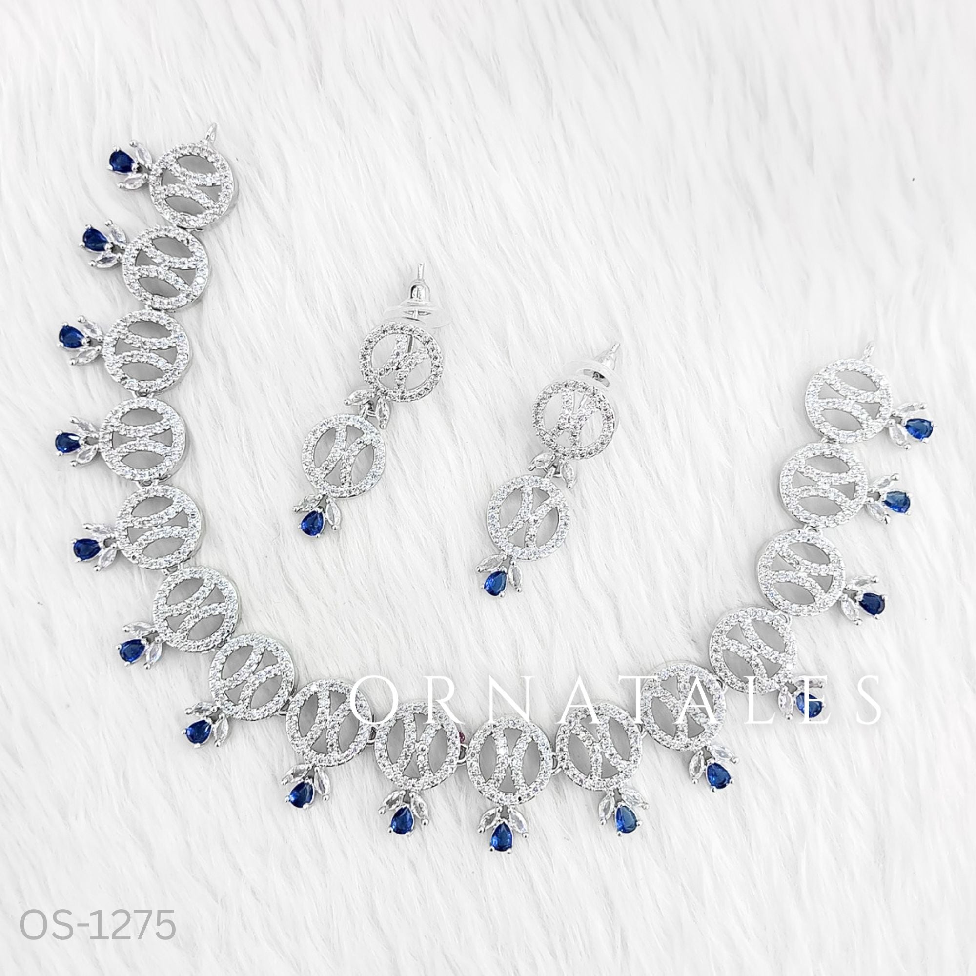 Royal Blue Diamond Cut Necklace Set with interlinked round loops, droplet stones, and matching earrings – elegant festive jewellery – Ornatales