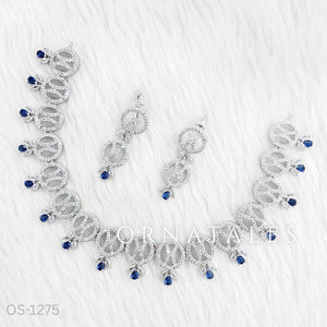 Royal Blue Diamond Cut Necklace Set with interlinked round loops, droplet stones, and matching earrings – elegant festive jewellery – Ornatales