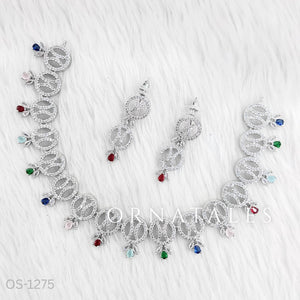 Multicolor Diamond Cut Necklace Set with interlinked round loops and droplet stones – festive jewellery with matching earrings – Ornatales