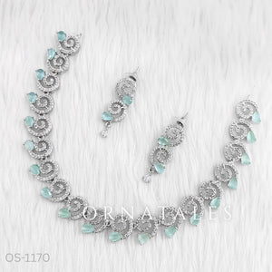 Mint Diamond Cut Spiral Necklace Set with droplet stones and matching earrings – elegant swirl design – Ornatales