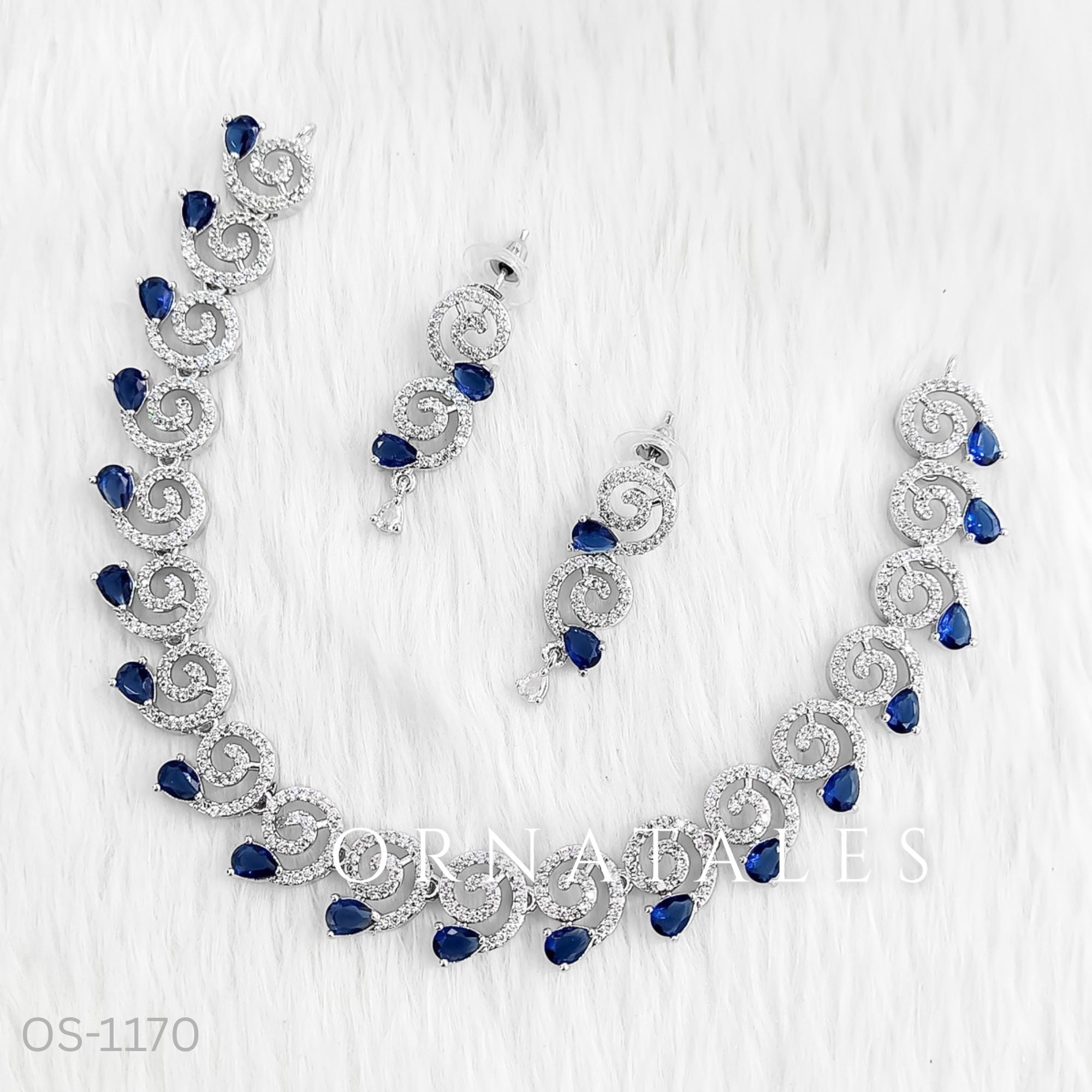 Royal Blue Diamond Cut Spiral Necklace Set with droplet stones and matching earrings – elegant swirl design – Ornatales