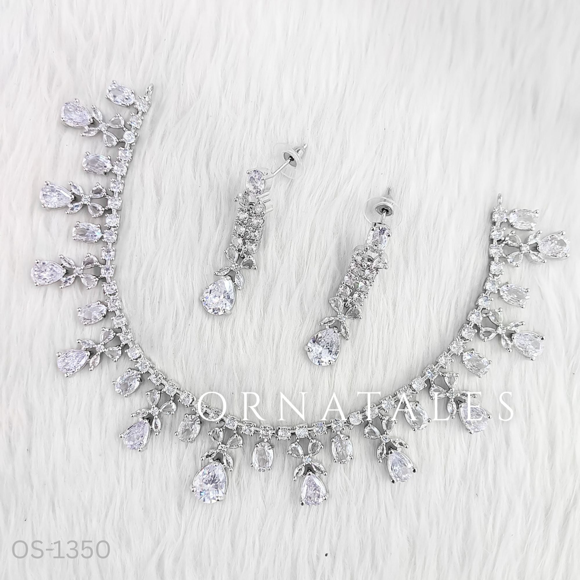 Crystal White Diamond Cut Necklace Set featuring cascading teardrop stones and clustered diamond detailing – Ornatales