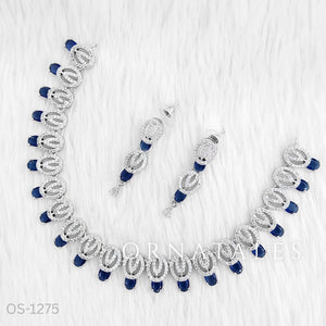 Royal Blue Diamond Cut Necklace Set featuring spiral motifs with teardrop stones – Ornatales