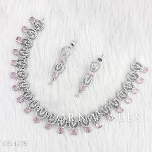 Pink Diamond Cut Necklace Set featuring spiral motifs with teardrop stones – Ornatales