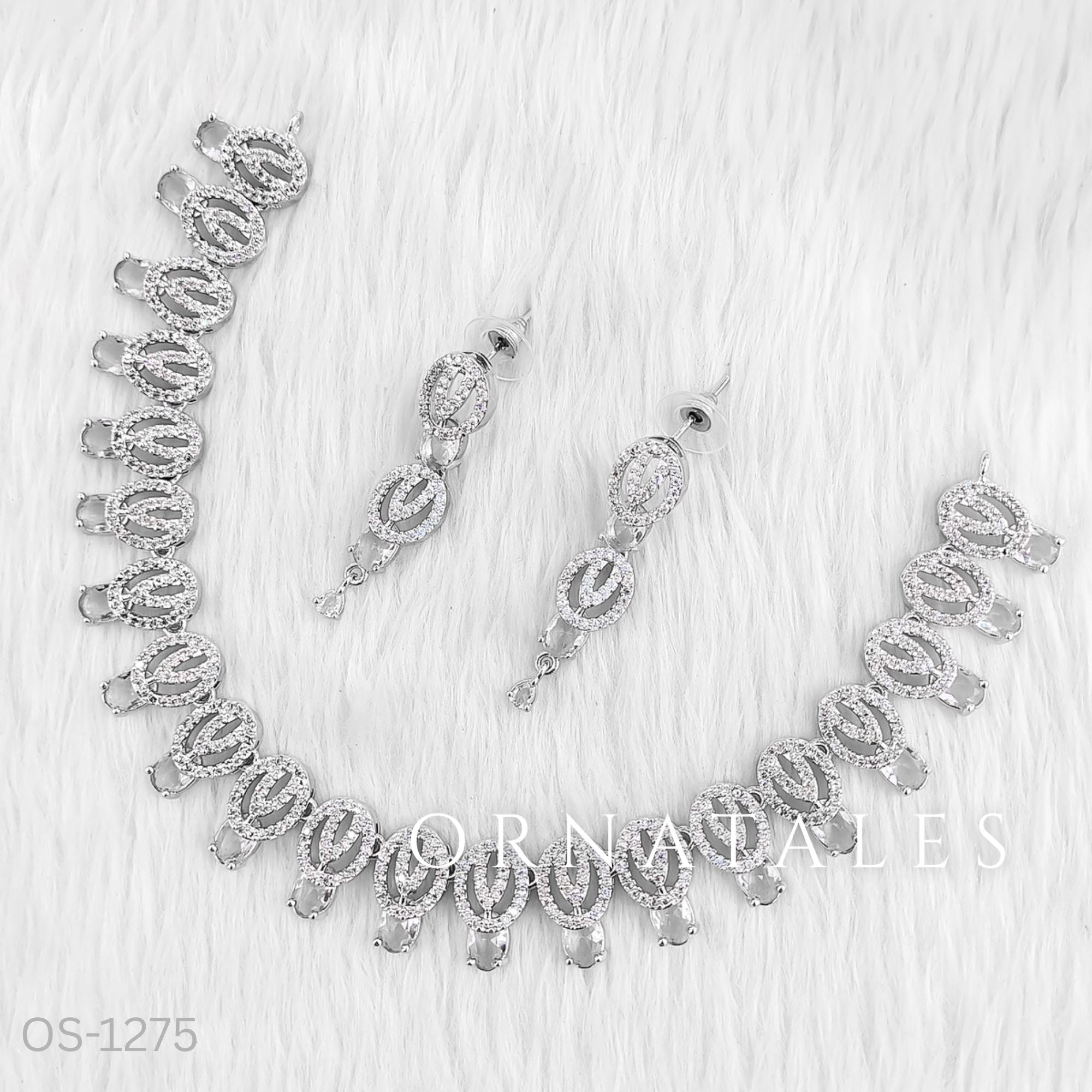 Crystal White Diamond Cut Necklace Set featuring spiral motifs with teardrop stones – Ornatales