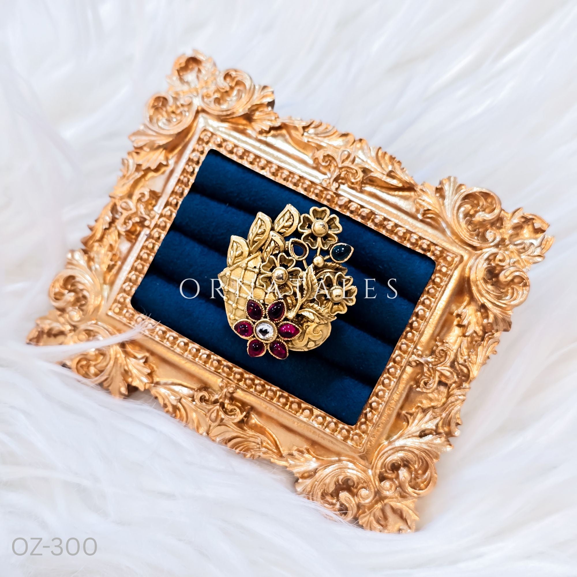 South Indian temple-inspired ring with matte gold finish, adjustable size, and traditional embossed motifs.