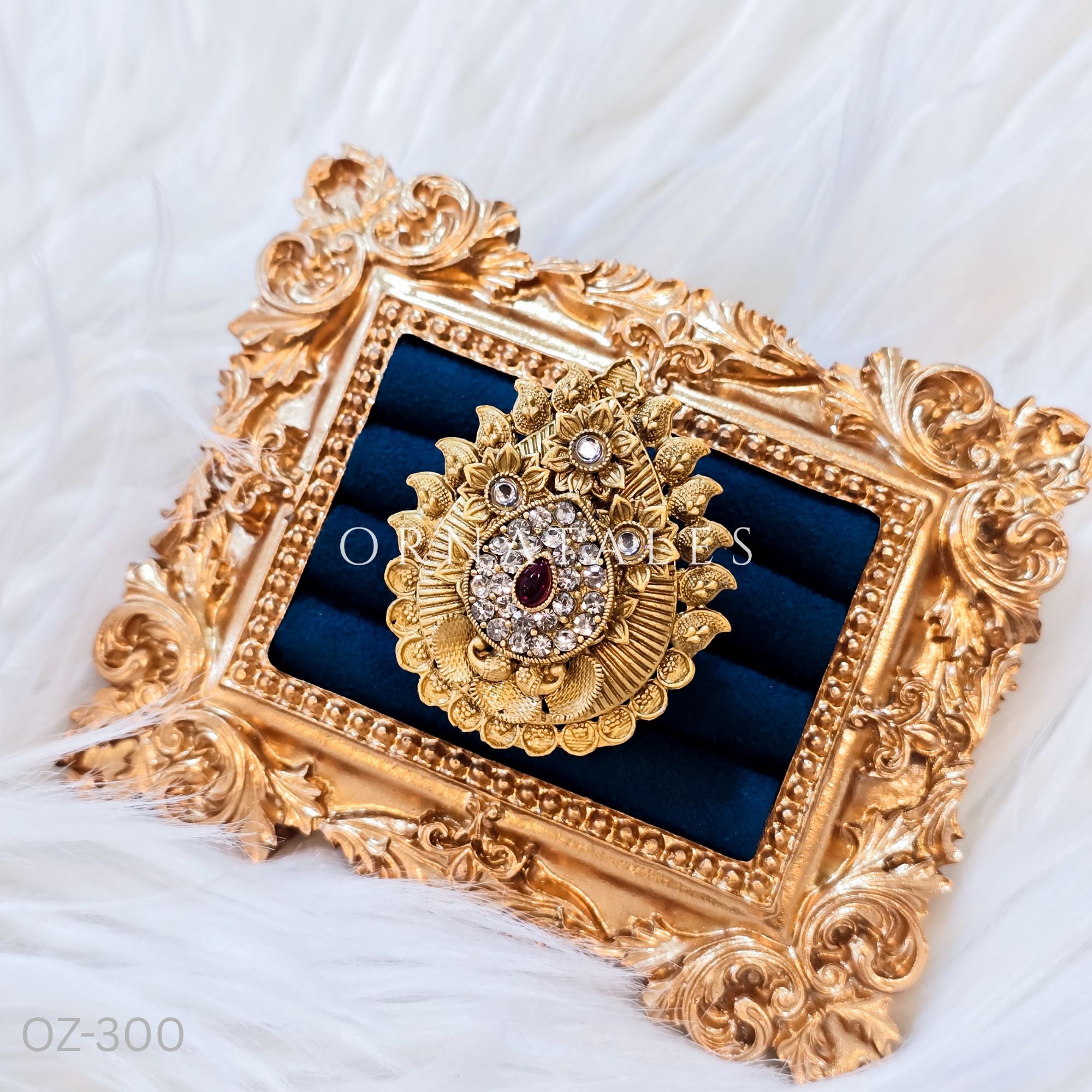 South Indian temple-inspired ring with matte gold finish, adjustable size, and traditional embossed motifs.