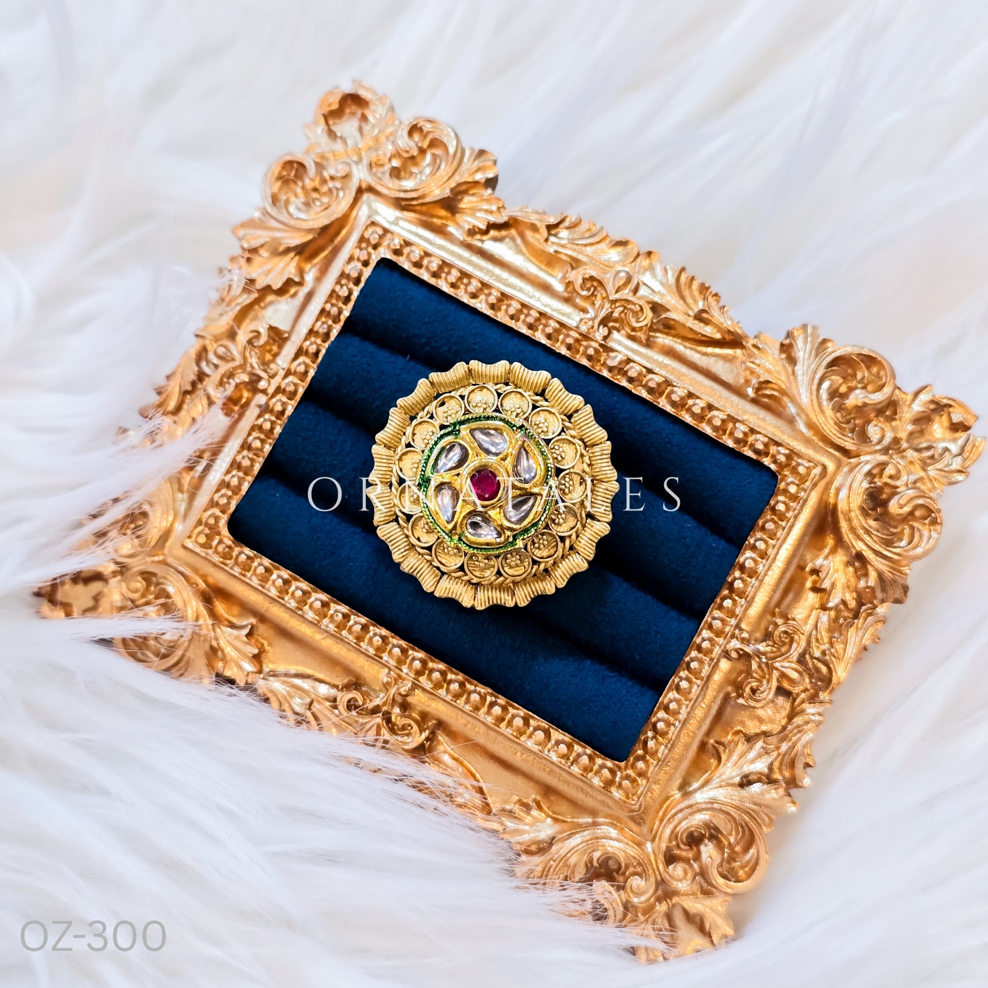 South Indian temple-inspired ring with matte gold finish, adjustable size, and traditional embossed motifs.