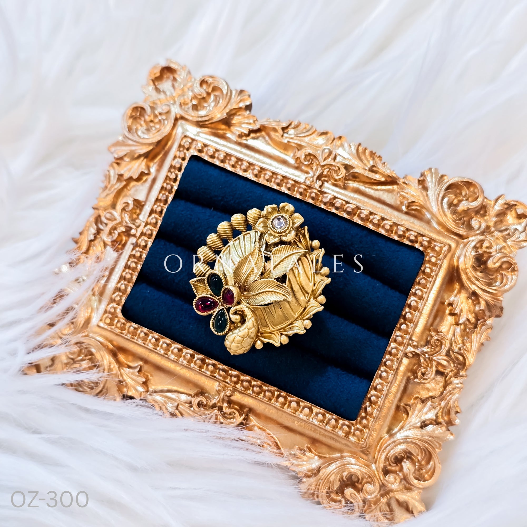 South Indian temple-inspired ring with matte gold finish, adjustable size, and traditional embossed motifs.