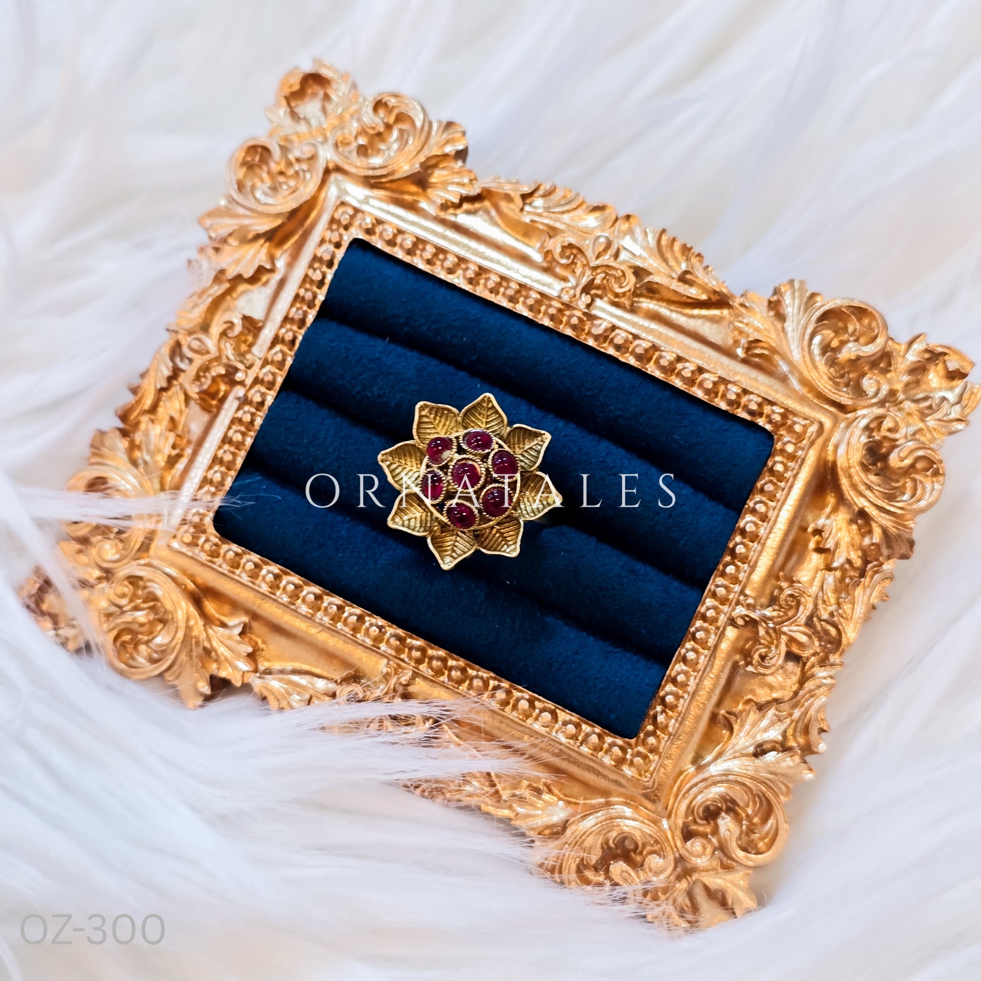 South Indian temple-inspired ring with matte gold finish, adjustable size, and traditional embossed motifs.