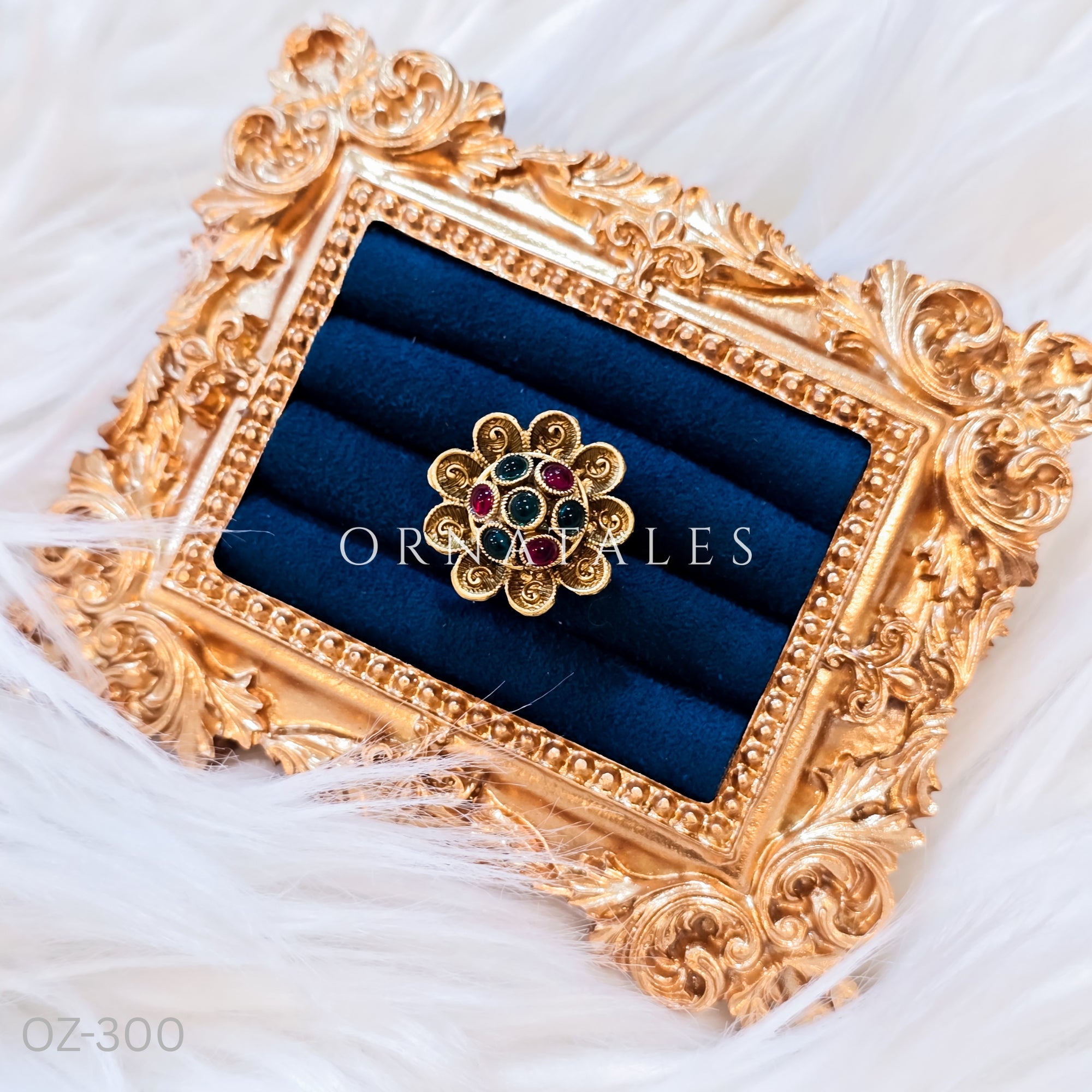 South Indian temple-inspired ring with matte gold finish, adjustable size, and traditional embossed motifs.