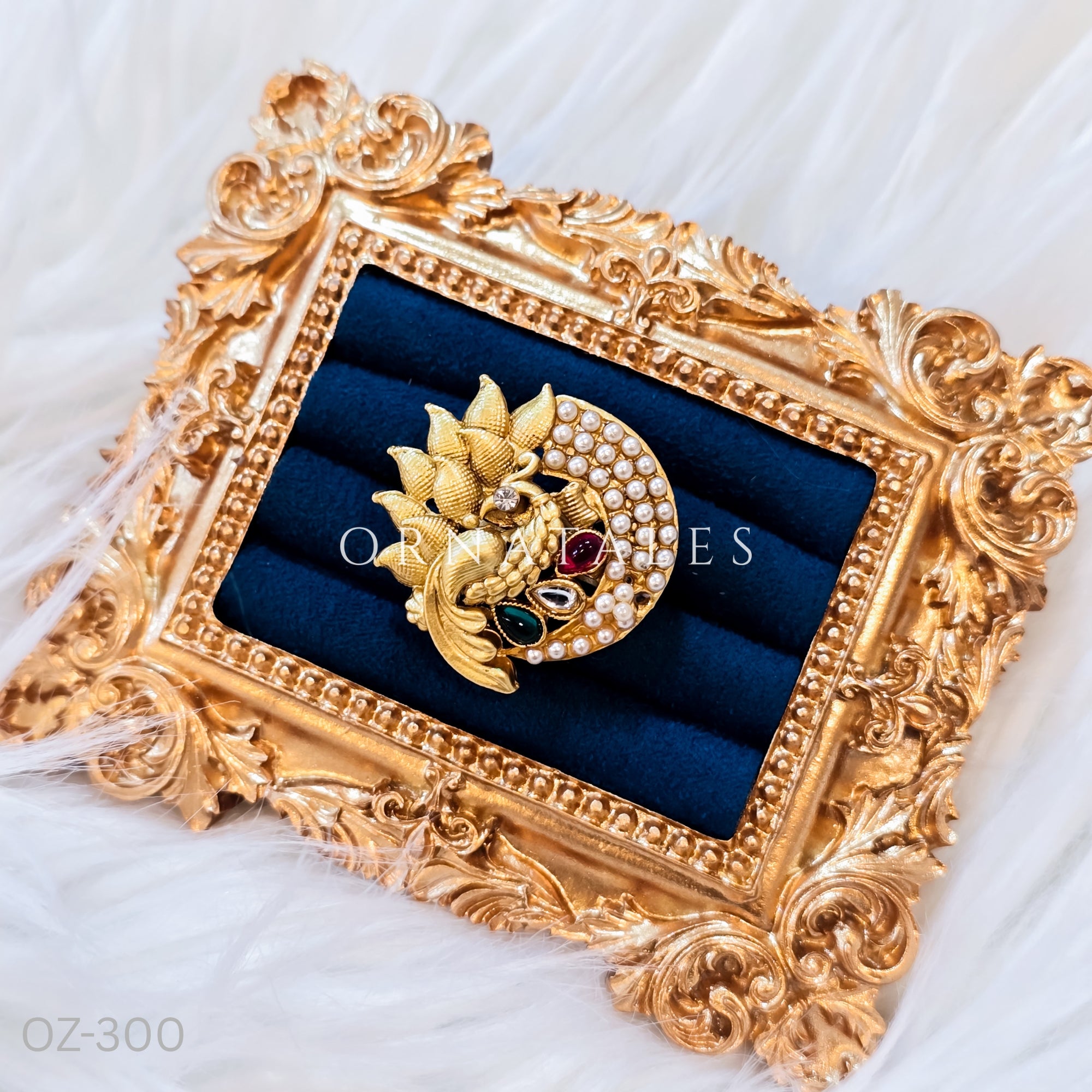 South Indian temple-inspired ring with matte gold finish, adjustable size, and traditional embossed motifs.