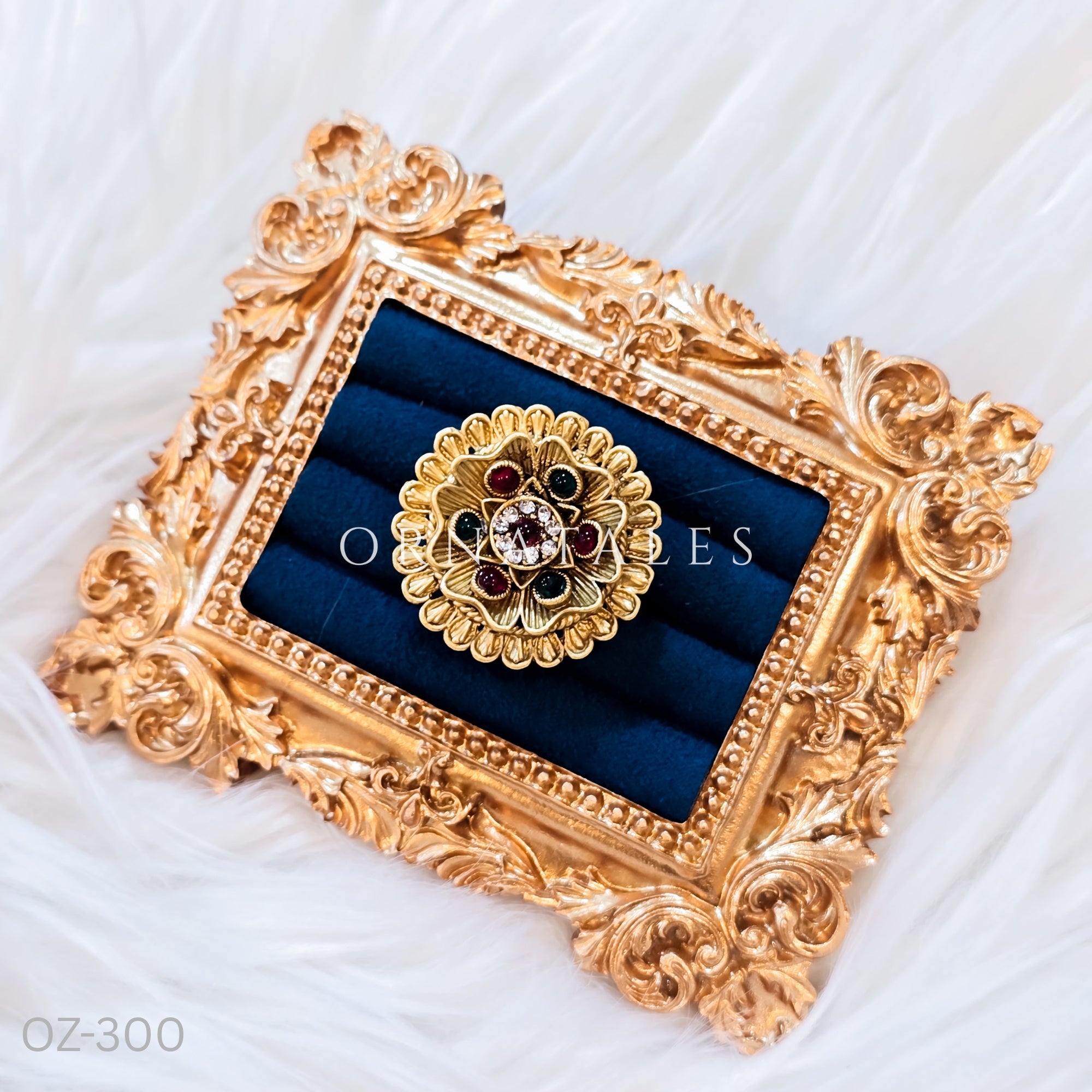 South Indian temple-inspired ring with matte gold finish, adjustable size, and traditional embossed motifs.