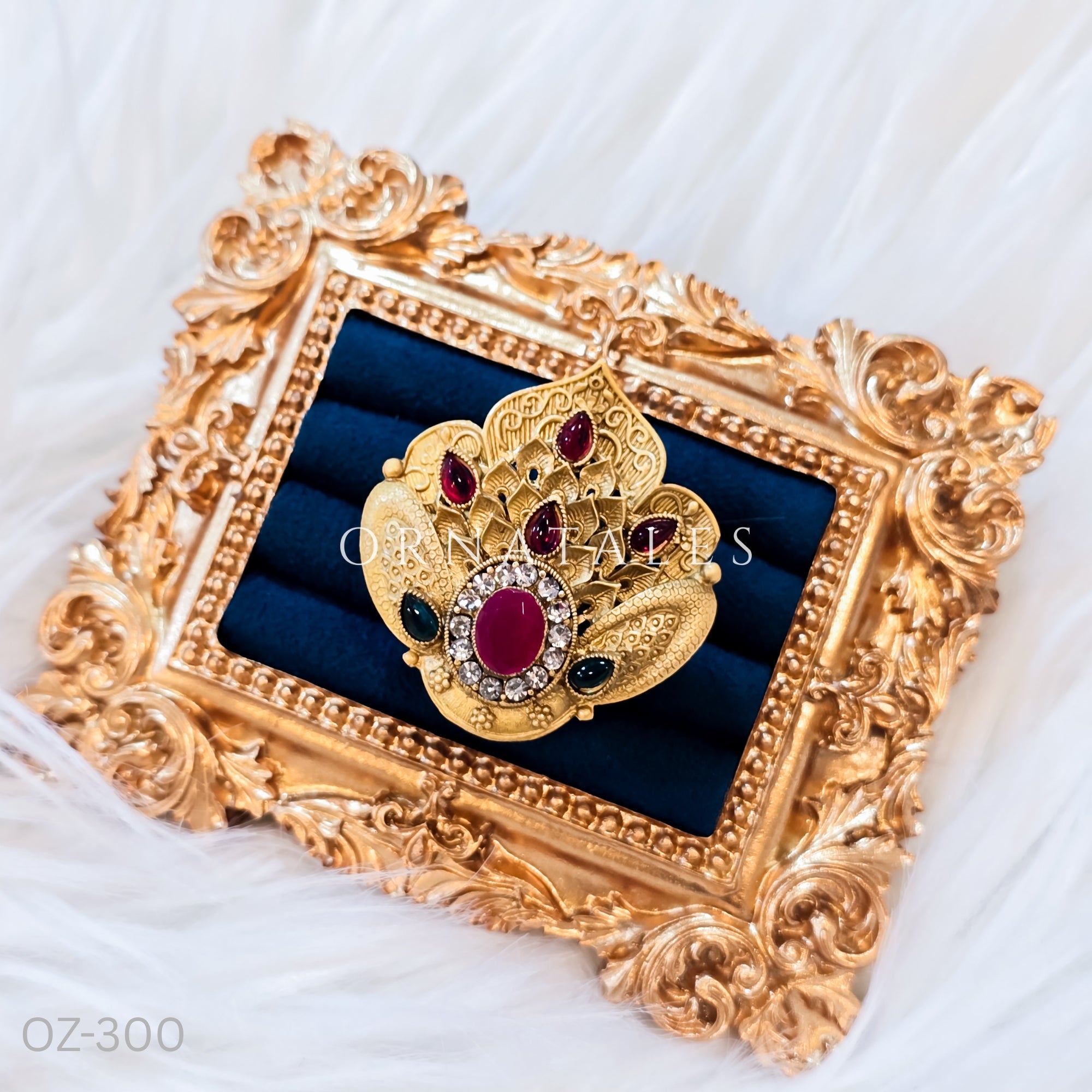 South Indian temple-inspired ring with matte gold finish, adjustable size, and traditional embossed motifs.