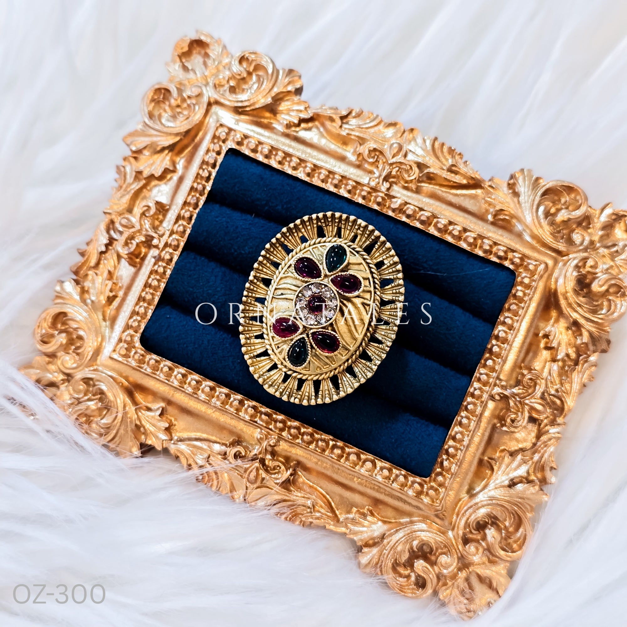 South Indian temple-inspired ring with matte gold finish, adjustable size, and traditional embossed motifs.