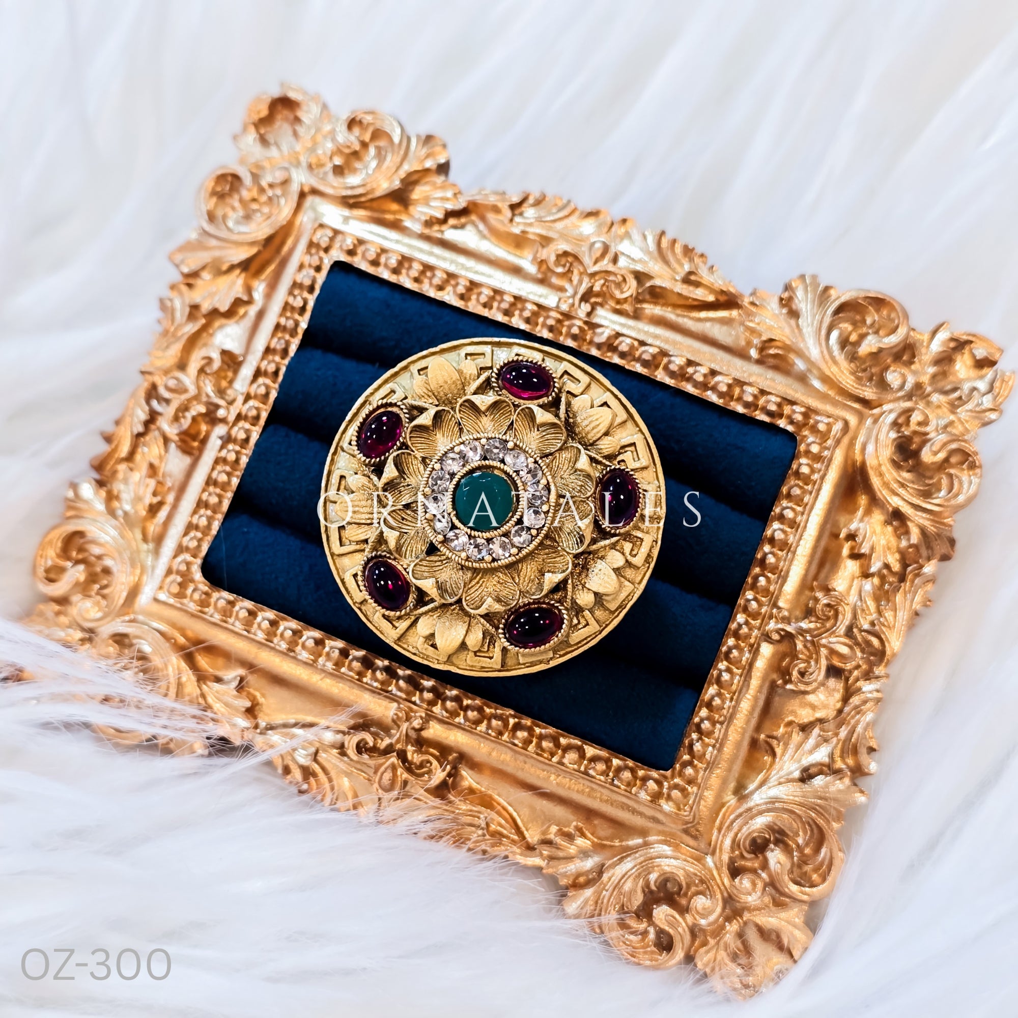 South Indian temple-inspired ring with matte gold finish, adjustable size, and traditional embossed motifs.