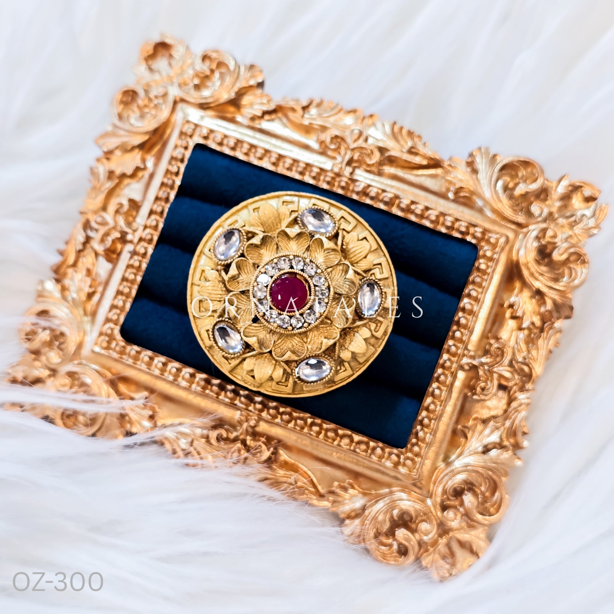 South Indian temple-inspired ring with matte gold finish, adjustable size, and traditional embossed motifs.