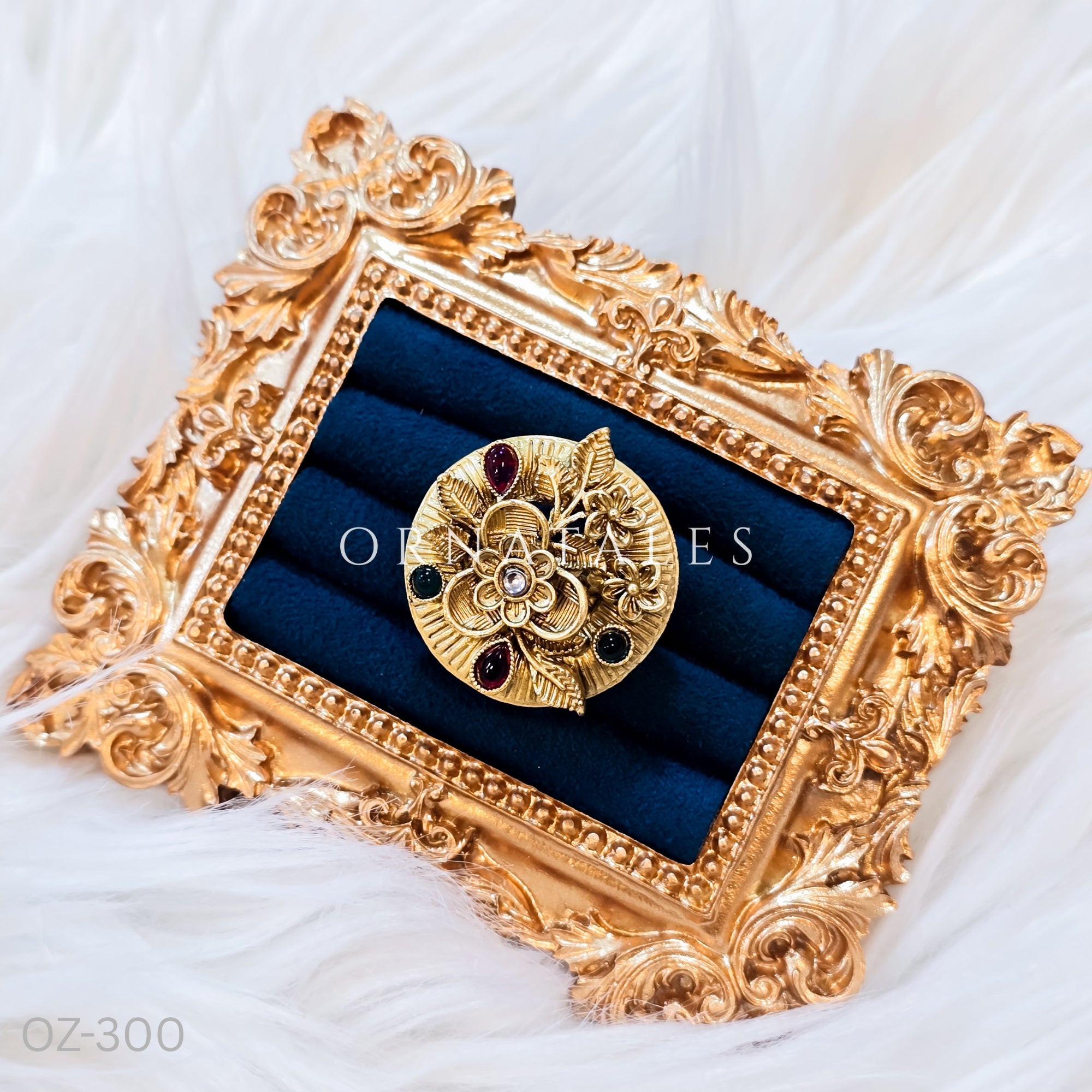 South Indian temple-inspired ring with matte gold finish, adjustable size, and traditional embossed motifs.