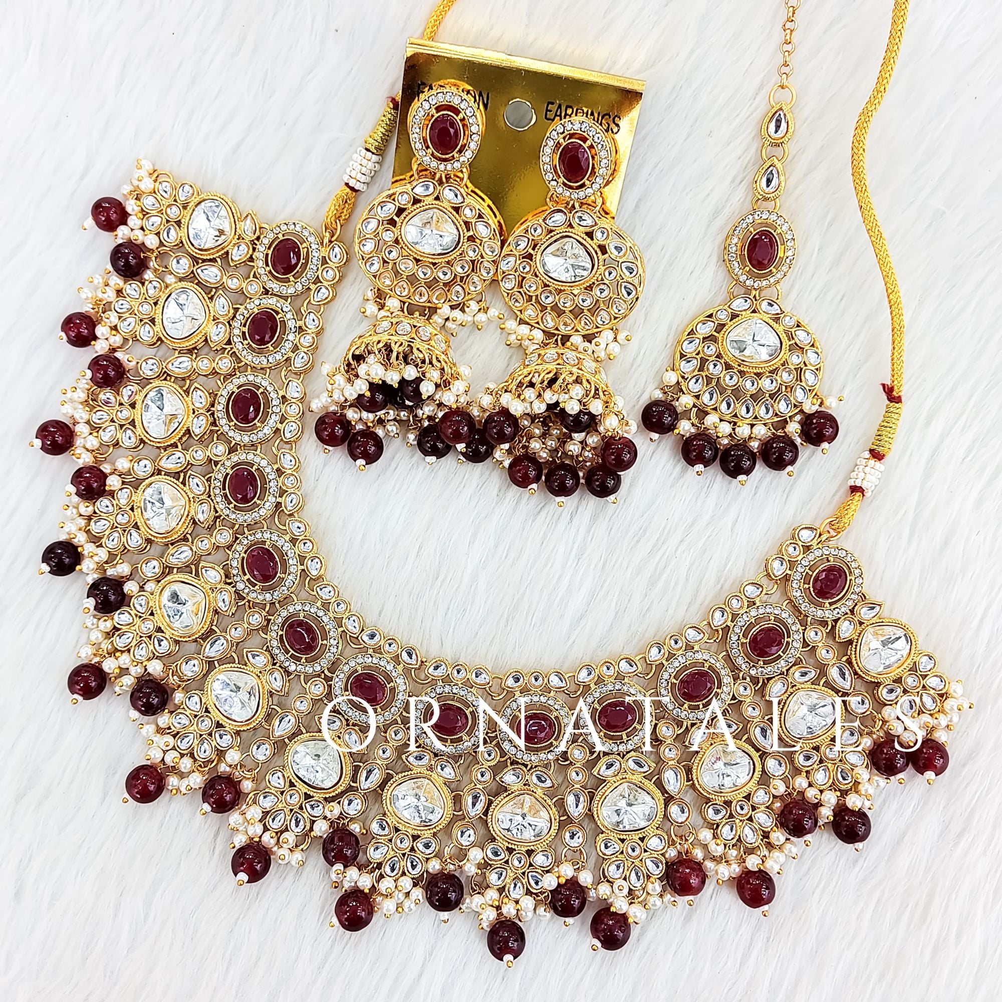 Maroon Pearl Kundan Necklace Set featuring Regal Polki Crest design with teardrop kundan and maroon pearls – Perfect for Bridal & Festive Look – Ornatales
